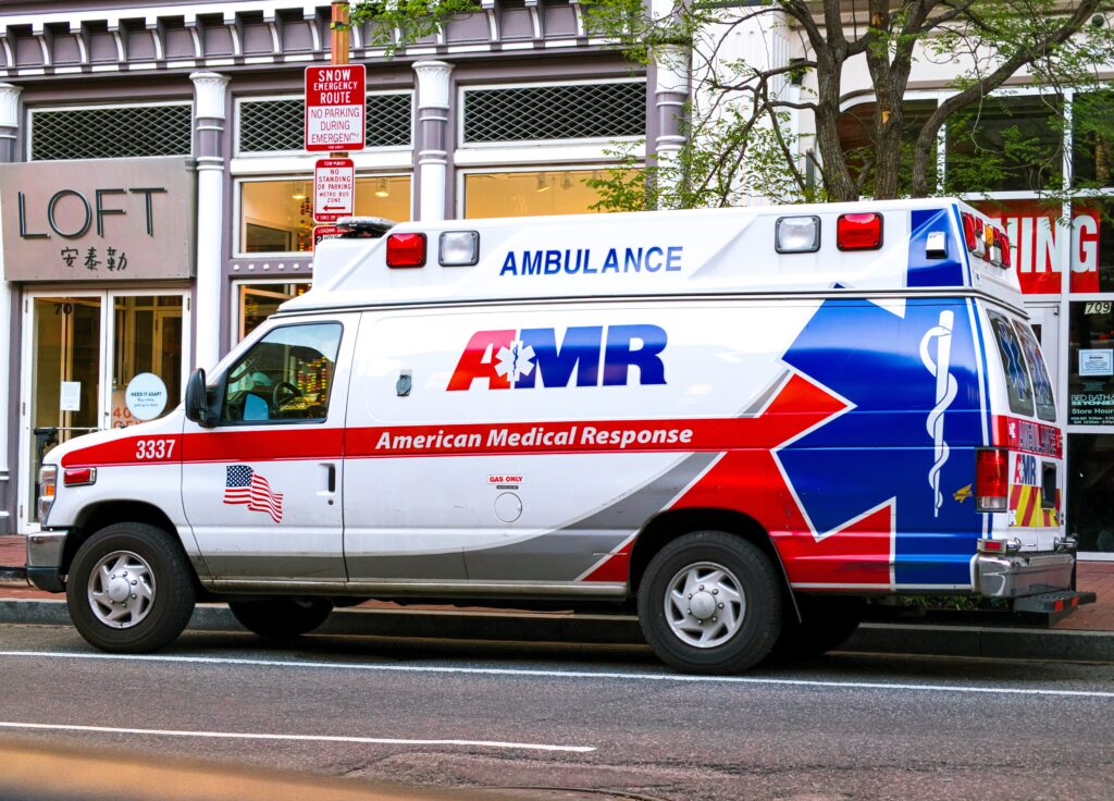 A first responder ambulance parked outside of Ann Taylor Loft in China Town, Washington DC during the Coronavirus pandemic. 