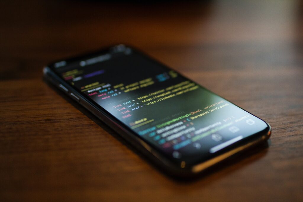 Cloud Computing and Cybersecurity 6 turned on black Android smartphone